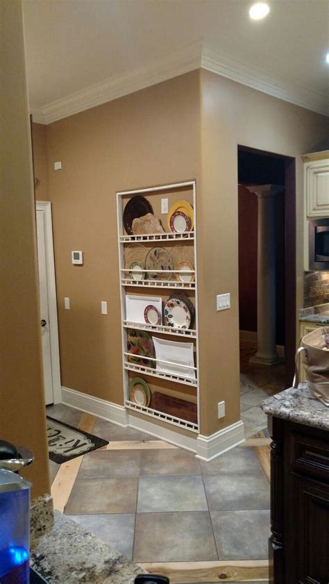 The tape easily peels away when the glue is completely. DYI Plate Rack to replace where an old built-in Fridge used to be. | Plate racks, Home decor ...
