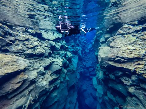 Unique Diving Between The Two Tectonic Plates At Silfra In Iceland Mr