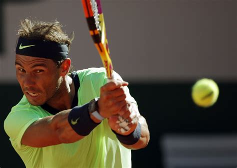 French Open Pix Nadal Djokovic Advance Rublev Upset Rediff Sports