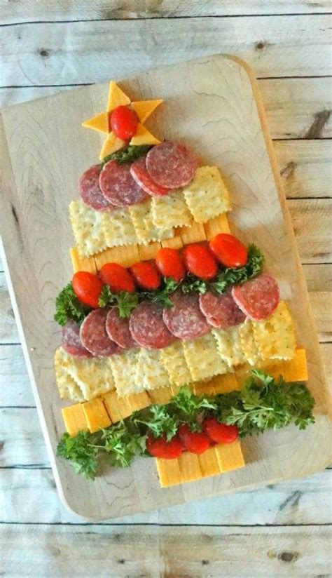 Cheesy spinach dip christmas tree is a masterpiece. Amazing Holiday Cheese, Cracker and Sausage Christmas Tree ...