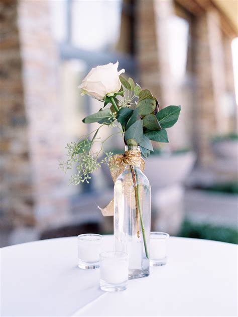 Simple Yet Elegant Centerpiece Green Leaves And A White Rose With