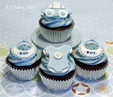 For a boy themed baby shower, chocolate cupcakes with blue frosting and sprinkles, it's a winner. Baby Boy Cupcakes! - CakeCentral.com