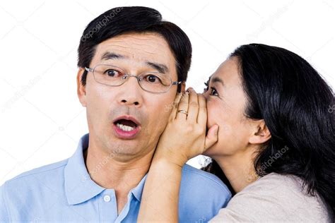 Woman Whispering Into Partners Ear Stock Photo By ©wavebreakmedia 97061246