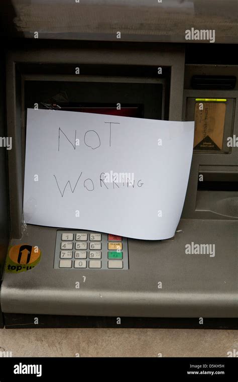 Atm Cash Machine Out Of Order With Not Working Hand Written Sign On