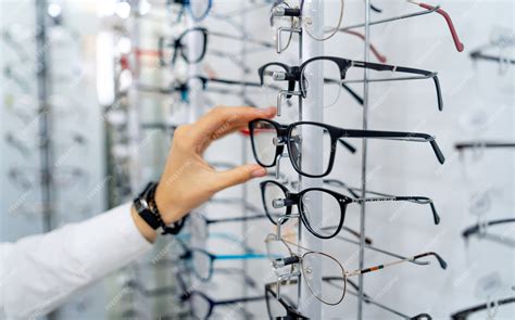 premium photo row of glasses at an opticians eyeglasses shop stand with glasses in the store