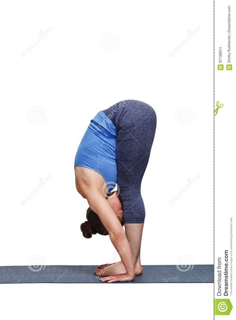 Woman Doing Yoga Asana Uttanasana Standing Forward Bend Stock Photo