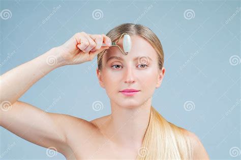 Face Massage Beautiful Woman Getting Massage Face Using Roller Massage Stock Image Image Of