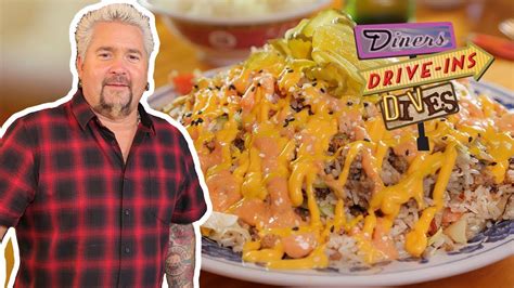 guy fieri tastes cheeseburger fried rice diners drive ins and dives with guy fieri food