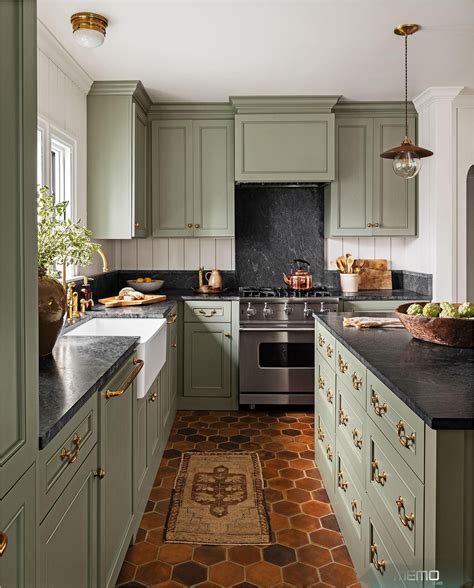 Green cabinetry lives in harmony with warm wood shelving and industrial light fixtures in this farmhouse kitchen. Feb 24, 2020 - From sage green to bright mint, we've got ...