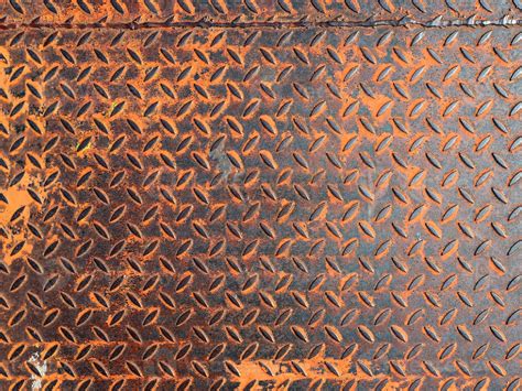 Rusty Floor Steel Panel Grunge Tread Plate With Orange Rust 12865355