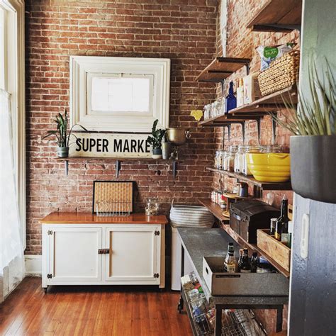 Like most kitchen designs, hardwood flooring works well in an industrial kitchen. 18 Kitchens with Exposed Brick Walls | Kitchn
