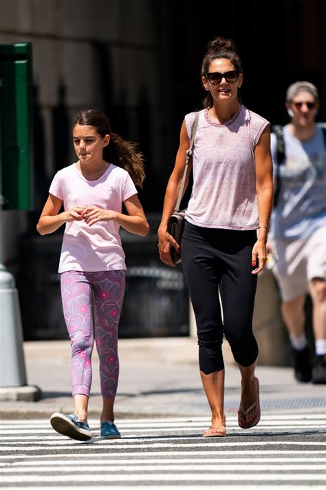 katie holmes and suri cruise wear matching outfits in nyc photos