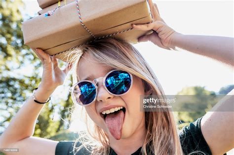 Girl Sticking Tongue Out Photo Getty Images