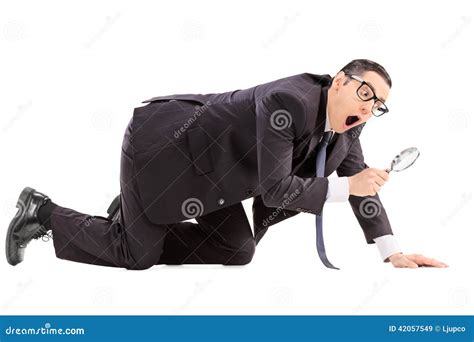 Man Searching For Something With A Magnifier Stock Image Image Of