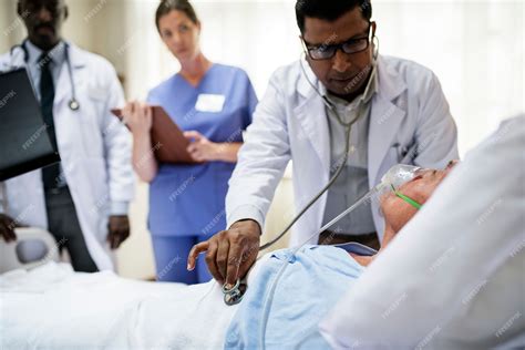 premium photo doctor checking a patient