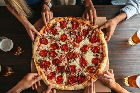 Why Pizza Is The Ultimate Gathering Food Slice Share And Savor Foodrinke