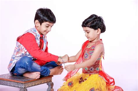 Premium Photo Cute Indian Brother And Sister Celebrating Raksha