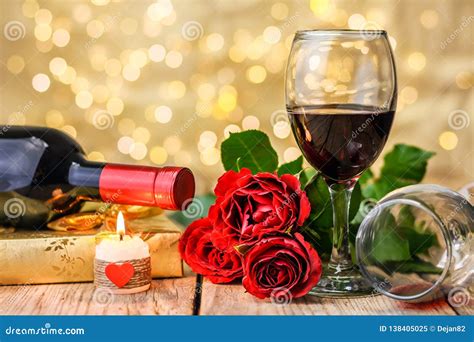 A Glasses Of Wine Roses T And Burning Candle Stock Image Image