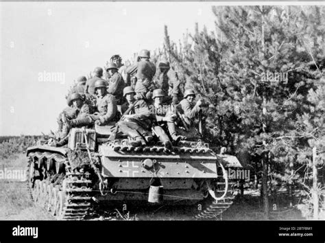 German Soldiers Ride On A Tank Operation Barbarossa German Invasion