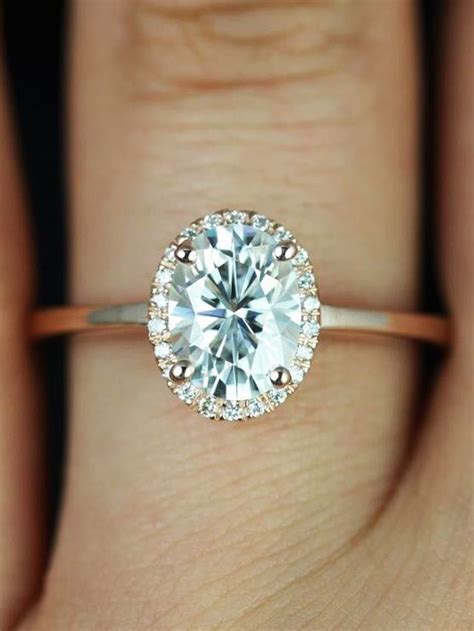 How To Make Your Engagement Ring Look Bigger Yes Really Pave Halo