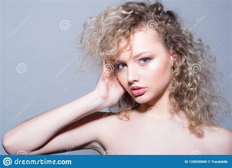 Woman With Beauty Face And Curly Blond Hair Lets Someone See The Beauty Throught Your Eyes