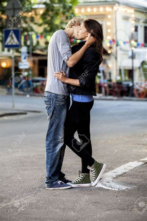 14056258 Young Couple Kissing On The Street Stock Photo Romantic Kiss