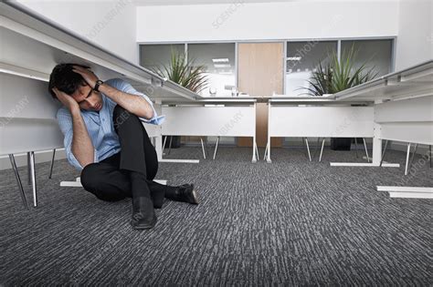 Man Hiding Under Desk Stock Image F0038205 Science Photo Library