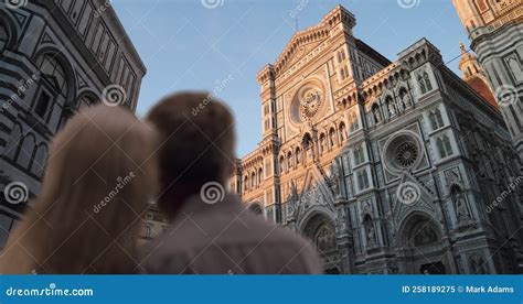 rear view of mature couple gazing at the florence cathedral stock video video of woman