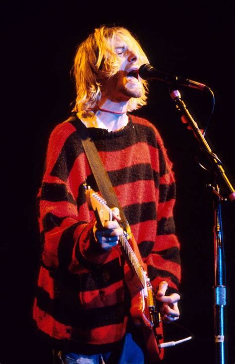 Cobain, dressed in a tigger suit for the inside cover of the magazine, is careering from one end of it's hard to relate this scene back to the rumours that are swirling endlessly around: How Kurt Cobain Defined the Grunge Aesthetic - The Pop Cult