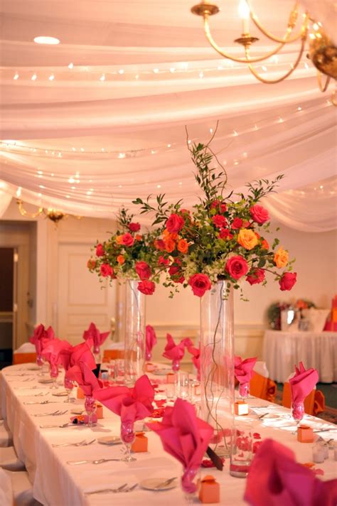 tall bright pink and orange wedding centerpieces in 2023 pink wedding decorations pink wedding