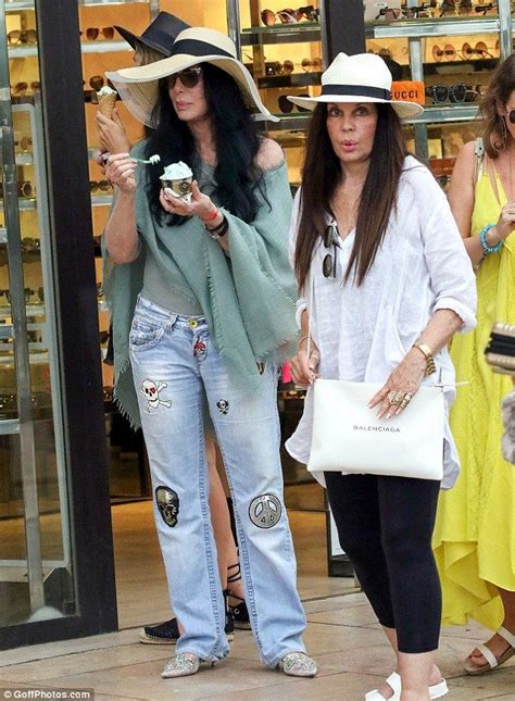 Cher 72 Cools Off With An Ice Cream In St Tropez Cher Photos Cher Outfits Cher Fashion