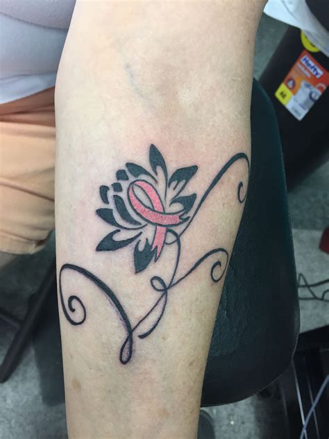 Maybe you would like to learn more about one of these? This tattoo honors my sister in law. A lotus flower and a ...
