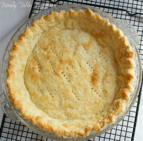 A Pie Sitting On Top Of A Cooling Rack