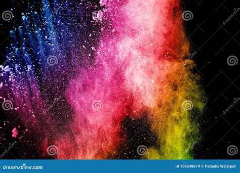 Abstract Multicolored Powder Explosion On Black Background Color Dust