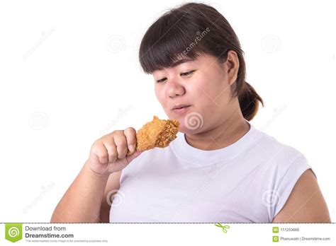 Fat Asian Woman Holding And Eating Fried Chicken Isolated On White Food And Healthcare Concept