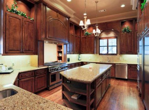 K and k custom cabinetry. Countertop. Island in the middle of kitchen. High end ...