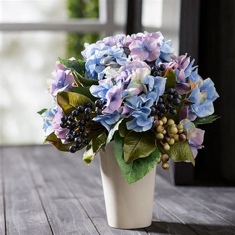 Silk flowers have one intrinsic quality that will always make them a better choice over regular flowers and that is that they never die. House of Hampton® Silk Hydrangea Floral Arrangement in ...