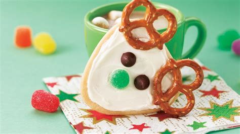 Spread it over the cooled biscuits, decorate with edible balls and thread with ribbon when dry. Frosted Reindeer Cookies recipe from Pillsbury.com