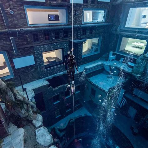 first look world s deepest diving pool opens in dubai tatler asia