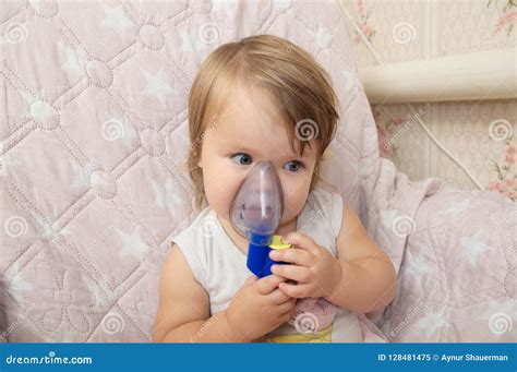 Sick Baby Girl Use Nebulizer Mask For Inhalation Respiratory Procedure