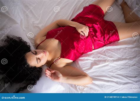 Brunette Girl In Red Pajamas Sleeping In Bed Stock Photo Image Of