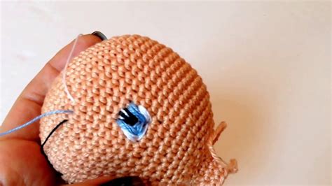 With the black embroidery thread and a wool needle, embroider the nose between rounds 19 and 20 and the snout between rounds 21 and 22. Amigurumi Pattern How to embroider eyes for doll ARANZA amigurumi By Petus - Amigurumi Patterns