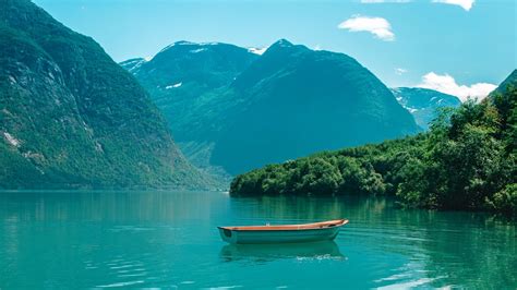 Also, the desktop background can be installed on any operation system: Boat Mountains Lake Water 4K HD Wallpapers | HD Wallpapers ...