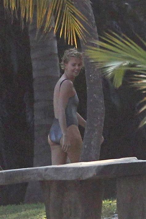 Charlize Theron In A Bikini Photoshoot In Miami Beach March