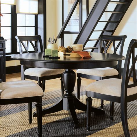 Ashleyfurniture.com has been visited by 100k+ users in the past month Camden Round Dining Table at Hayneedle