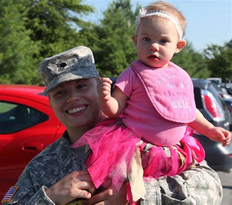 u s army spc abigail graham holds her daughter emily nara and dvids public domain archive