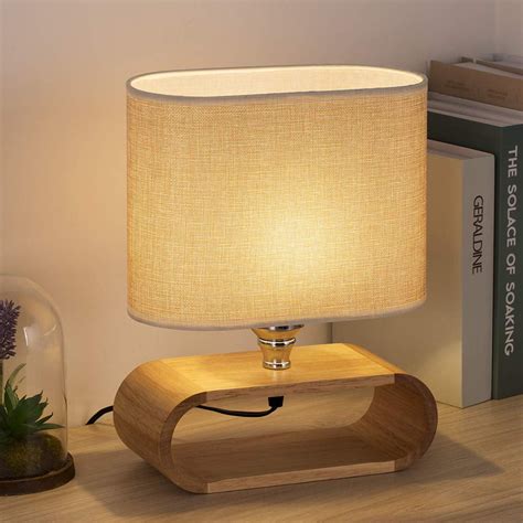 Bedside Wooden Nightstand Table Lamp With Oval Base And Fabric Shade
