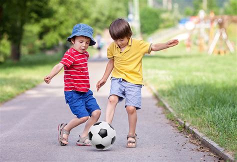 Two Boys Playing Soccer