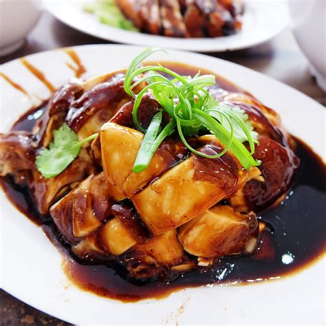 The sauce will reduce as the chicken cooks and get a bit syrupy. Soy Sauce Chicken at Lee Fun Nam Kee Chicken Rice And ...