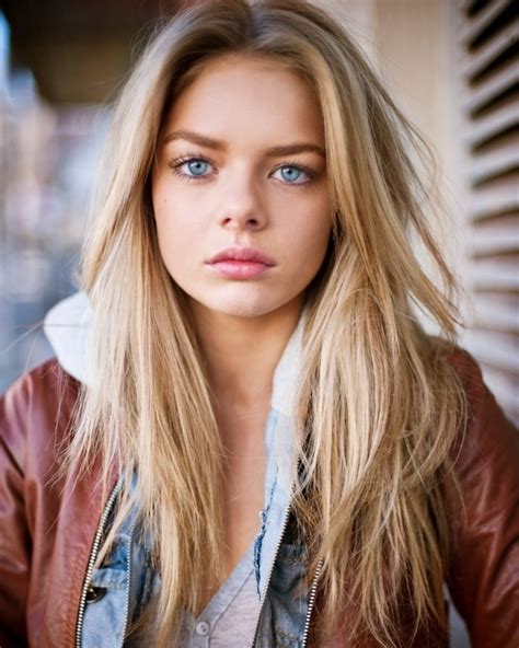 Girl With Blonde Hair And Blue Eyes The Beauty That Captivates